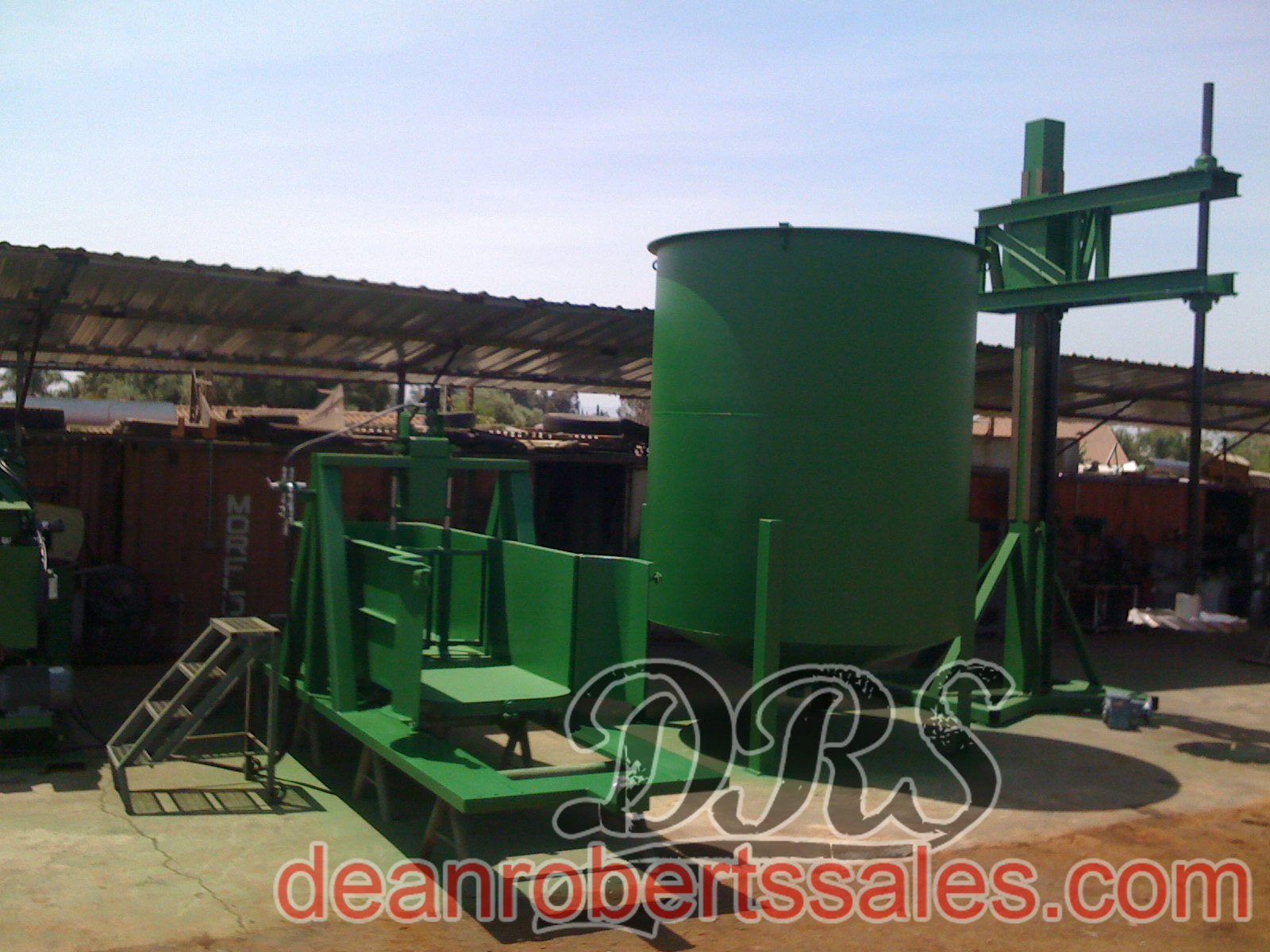 CUSTOM SPECIALTY SEALCOAT TANKS TRUCKS AND HELICAL MIXERS BY DEAN ROBERTS SALES.