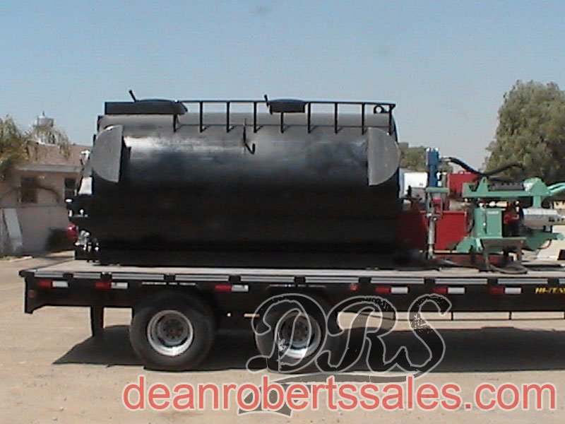 CUSTOM SPECIALTY SEALCOAT TANKS TRUCKS AND HELICAL MIXERS BY DEAN ROBERTS SALES.