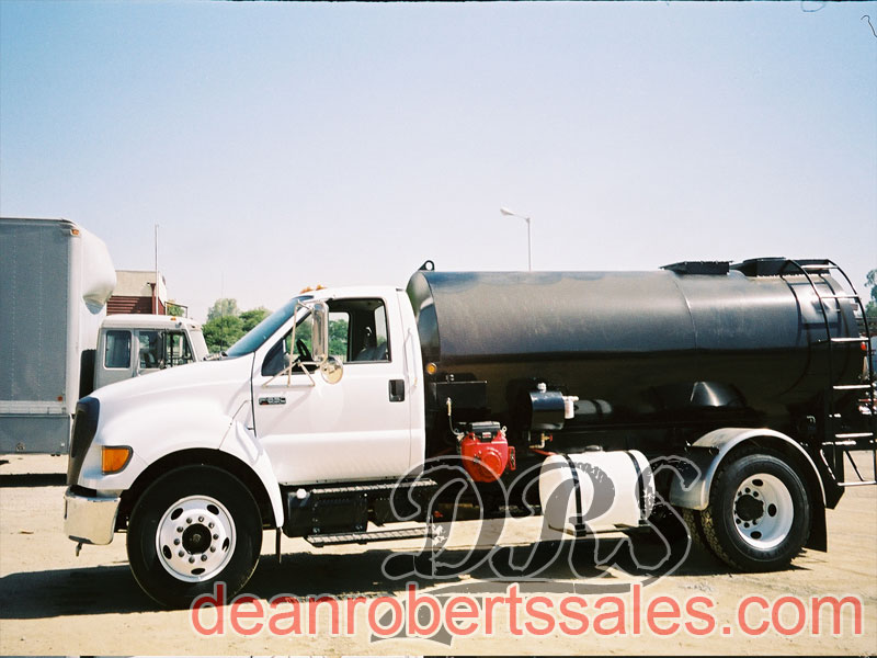 CUSTOM TRUCK MOUNTED SEALCOAT TANKS TRUCKS AND MIXERS.