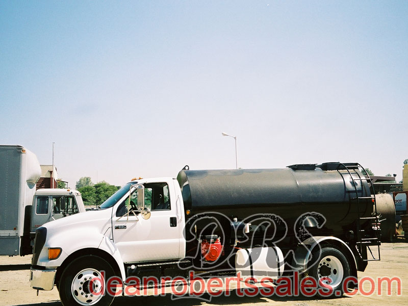 CUSTOM TRUCK MOUNTED SEALCOAT TANKS TRUCKS AND MIXERS.